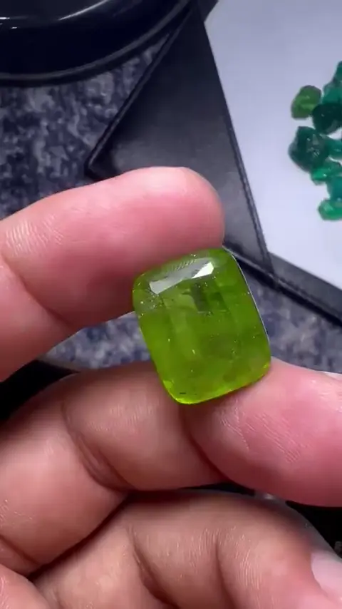 Cushion-shaped green gemstone